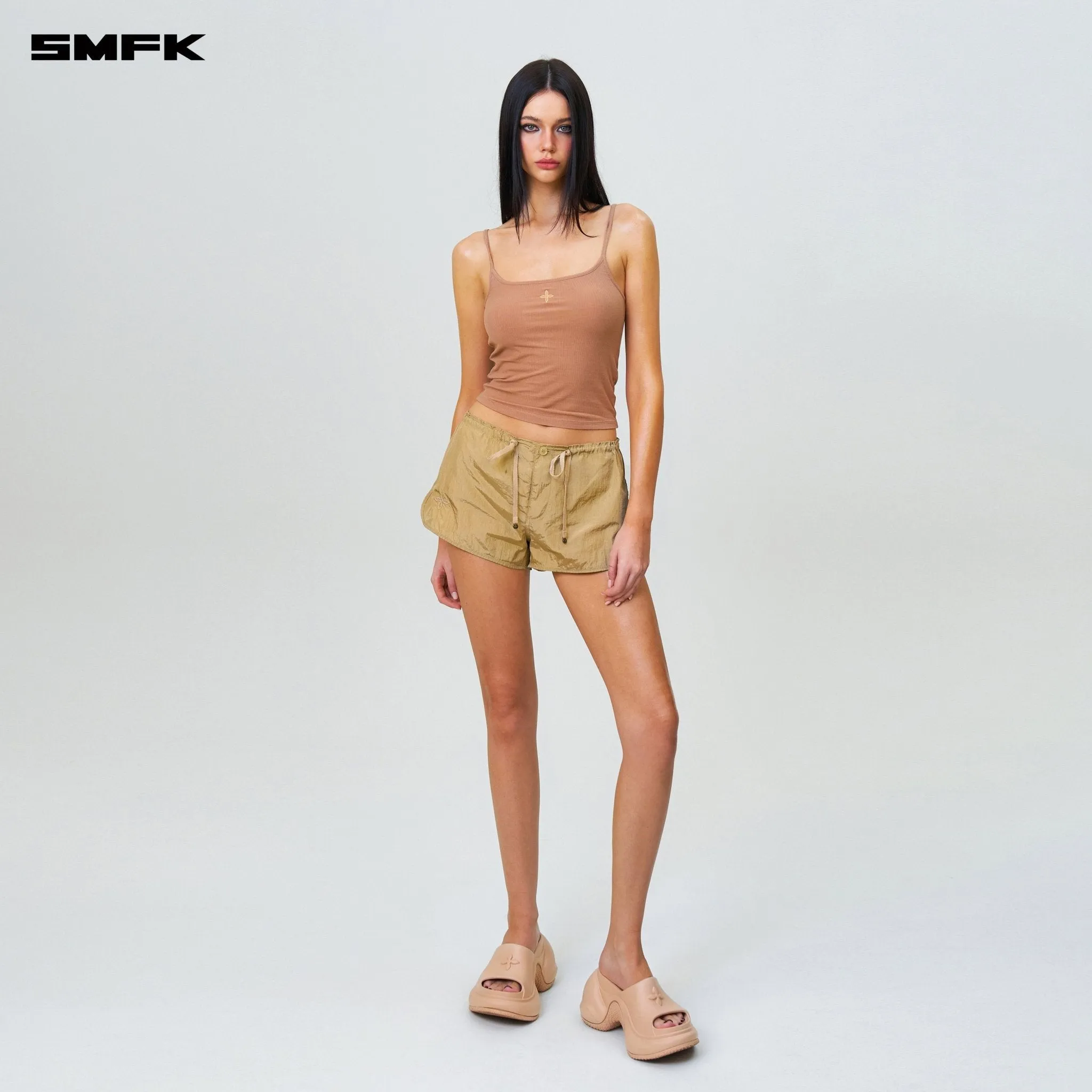 Ancient Myth Alloy Skin Low-Waist Jogging Shorts Gold